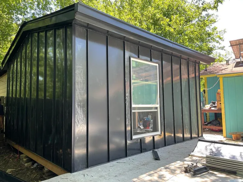 Black standing seam metal wall panels for Roof Inspection in Gastonia